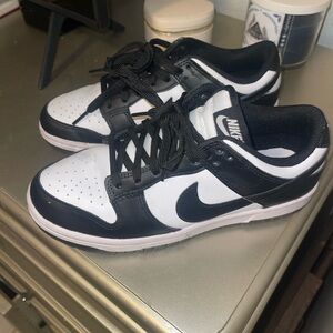 Women’s- black and white dunks size 7.5